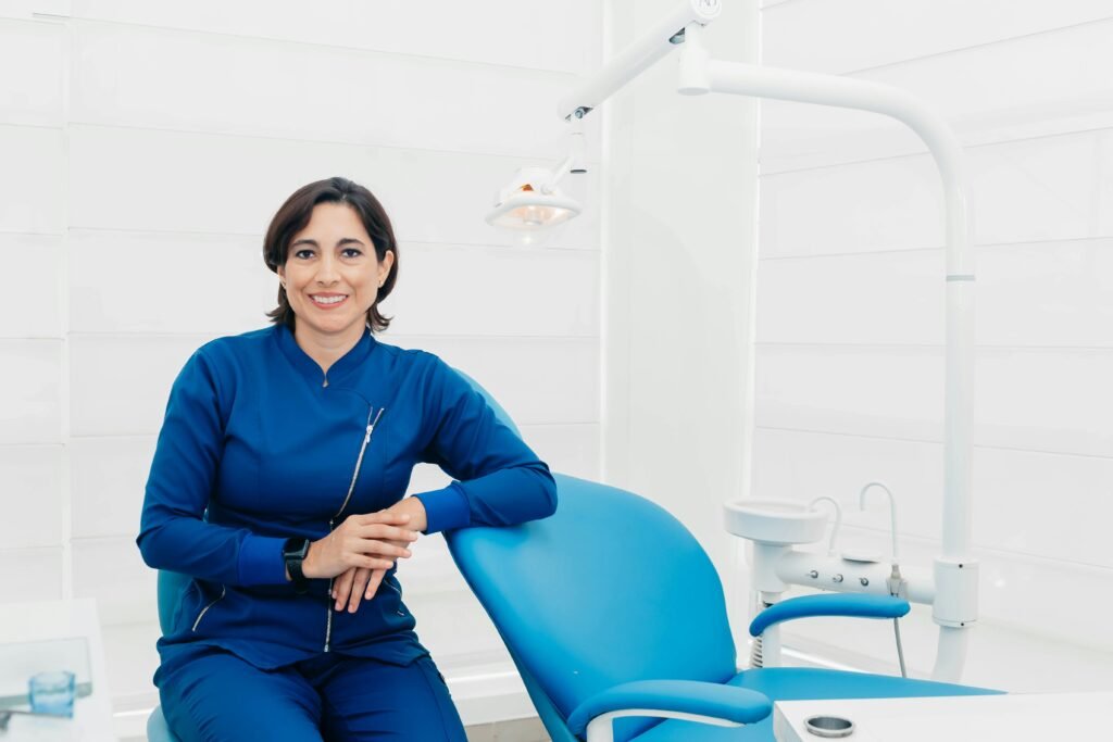AI visibility for dental practices - smiling dentist in modern dental office